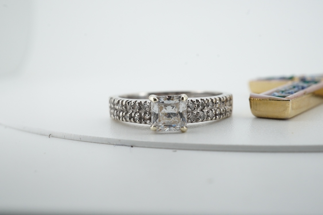 Two modern 9ct gold and cubic zirconia set rings, including white gold, two other simulated diamond set rings, together with an Italian cross pendant, a cameo brooch and an oval gilt metal locket.